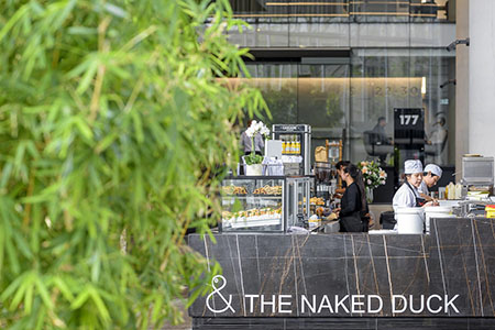 Naked Duck Café, by H+E Architects